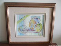 Front view of framed painting showing artwork and frame