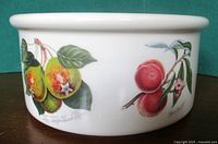 Side view showing fruit motif and overall shape