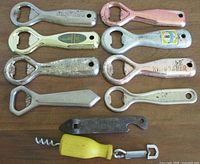 All ten openers and corkscrew laid out for overview