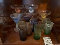 Assortment of frosted glasses including tumblers, martini and coupe styles