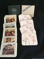 Both sets of coasters with their Jason boxes visible