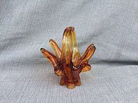 Front view of amber art glass basket