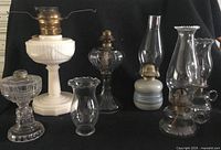 All lamps and bases arranged together showing overall quantity and styles