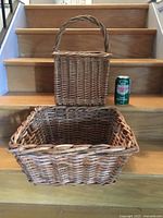 Square basket front and handled basket rear, soda can for scale