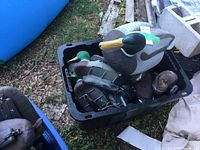 bin containing several weighted duck decoys including large drake