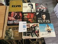 Overview of all nine Elvis CDs arranged in three rows