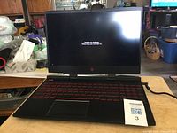 HP Omen laptop front view with screen on Windows update