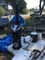 Full view of humidifier on table with nozzle attached