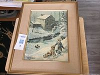 Front view showing entire framed print with signature and scene