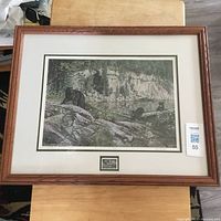 Full view of framed print with mat and stamp
