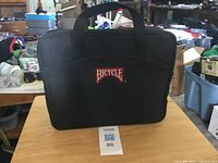 Front of black carrying case with Bicycle logo