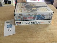 Spine view of three DVD box sets stacked showing titles and seasons