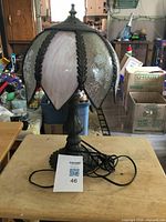 Full view of lamp showing base, shade and cord