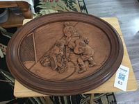 Full view of oval wood plaque