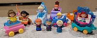 Group shot of all figures and carts