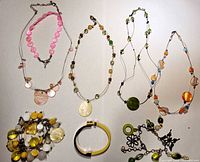 Overhead view showing all seven jewelry pieces
