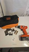 Full lot: drill, bag, bit sets