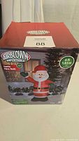 Front of box showing Airblown Inflatable Santa image and branding