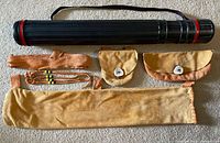 Whole lot showing arrow case and five suede accessories