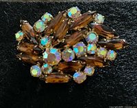 Front view showing topaz marquise stones and aurora borealis rhinestones