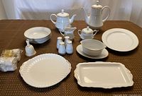 All items displayed front view on table