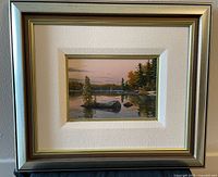 Full view of framed painting with mat and frame