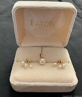Necklace and earrings displayed in Eaton jewellery box