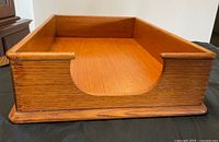 Front angled view showing overall construction and curved access cut-out