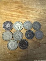 Ten El Salvador 5 centavos coins obverse and reverse views