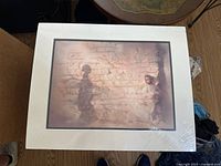 Front view showing artwork, mat, and overall presentation