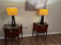Both Tarogo lamps on side tables showing matching design and shades