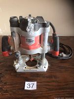 Front view of Black & Decker FireStorm plunge router showing handles, base and power cord