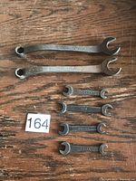All six Ford-stamped vintage wrenches laid out for size comparison