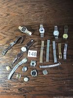 Overall lot with wristwatches, loose bands and watch heads