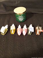 Full lot view: candle with six Wallflower refills