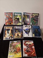 Full group shot of all eleven bagged and boarded comic books