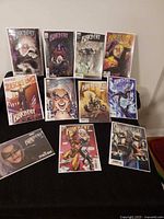 All 11 bagged and boarded Marvel Black Cat comics laid out