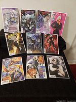 All ten Black Cat comic books laid out showing covers