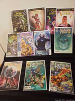 All ten comics laid out showing covers and protective bags