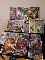 All fifteen bagged Fantastic Four comics laid out on table