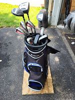 Full view of Ultimate golf bag containing Wilson Ultra driver, woods, hybrid, irons, wedges and putter