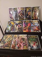 Front view showing all 12 bagged comics arranged in two rows