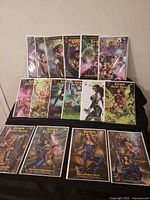 All fourteen bagged issues displayed in two rows on table