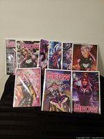 All eleven Miss Meow comic books displayed, showing variant covers and later issues