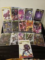 Overview of all sixteen Transformers Beast Wars comic books laid out, showing main and variant covers