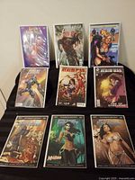 All nine comics displayed to show titles and covers
