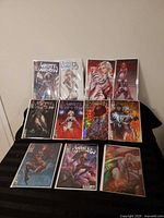 All eleven White Widow comics displayed on table
