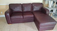 Full front view of sectional sofa with chaise