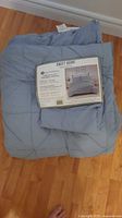 Comforter set folded with front label visible