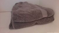 Folded gray bath towel